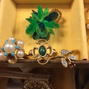 Bundle of costume jewelry rings in assorted colors